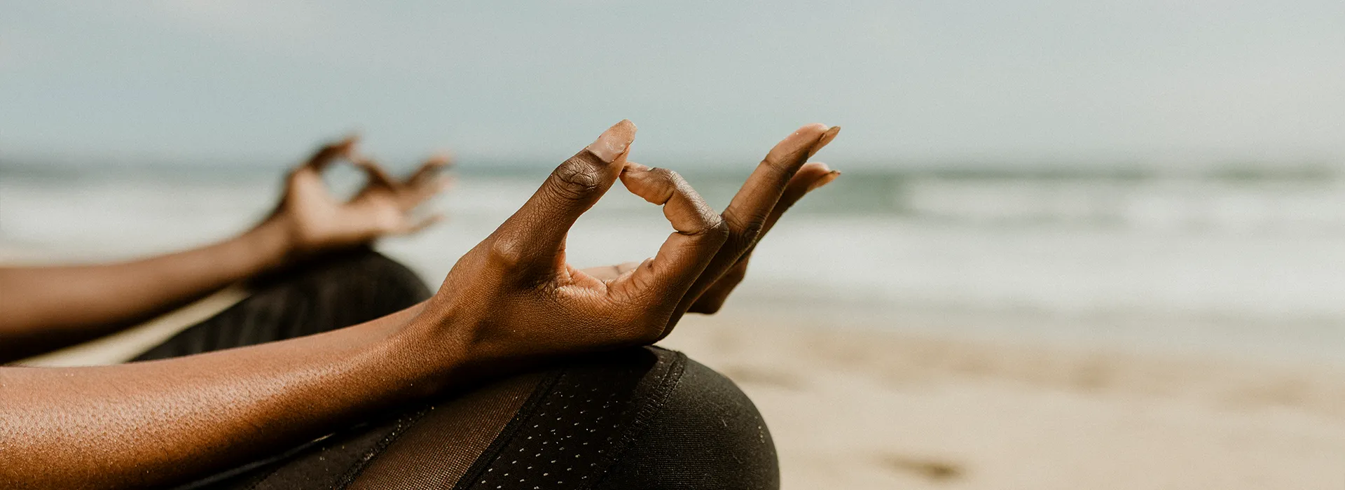 black-woman-meditating-beach