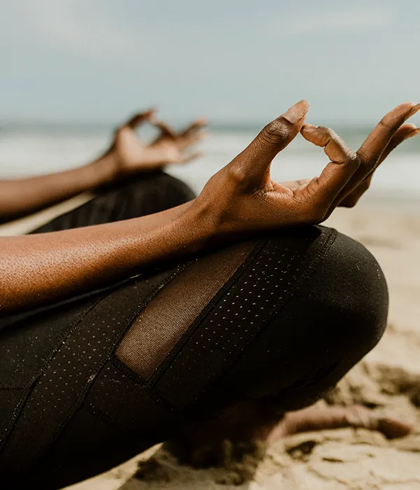 black-woman-meditating-beach