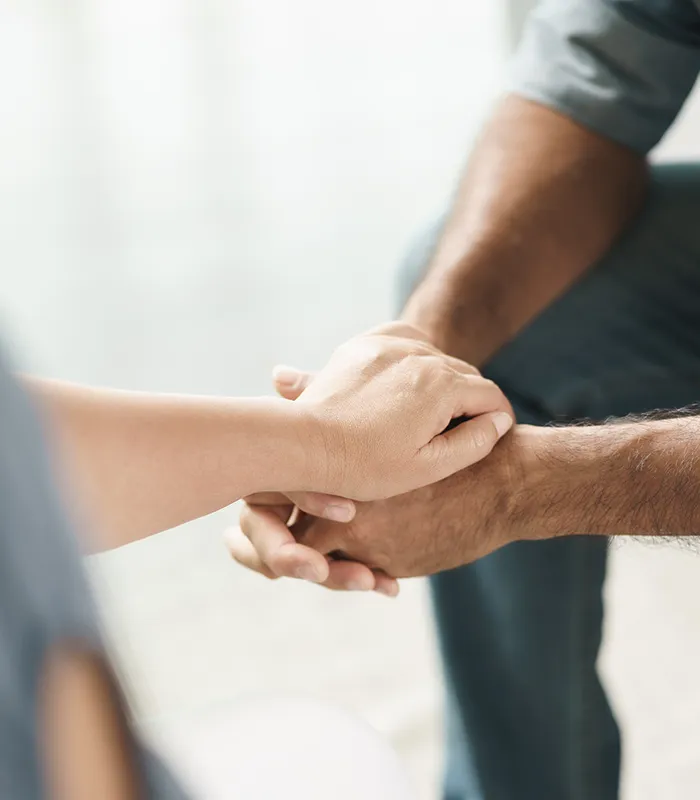 female-friend-family-sitting-hold-hands-cheer-up-mental-depress-man-psychologist-provides-mental-aid-patient-ptsd-mental-health-concept