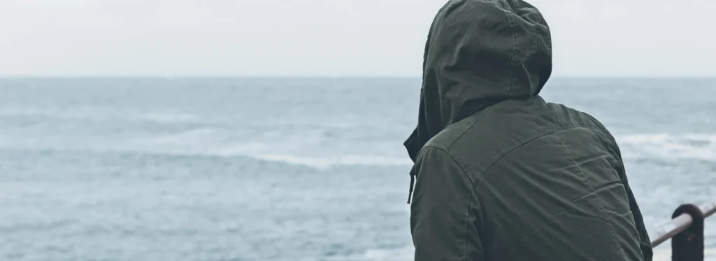 Man looking into the sea